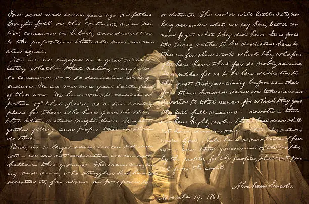 The Gettysburg Address in Abraham Lincoln's own handwriting overlayed on the statue of Abraham Lincoln inside the Lincoln Memorial in Washington DC.