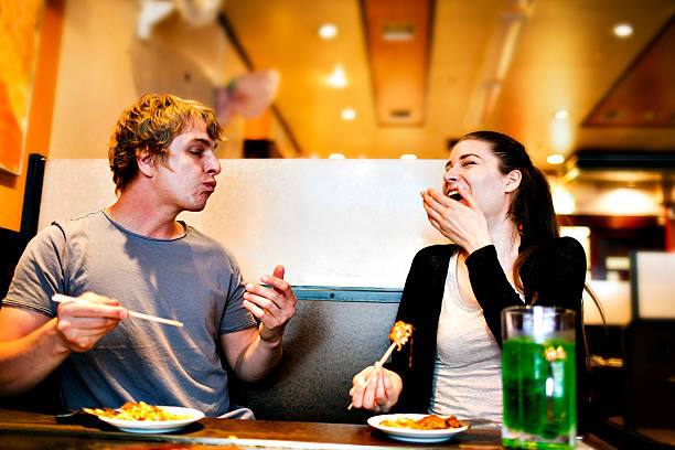istock Young people eating in Japanese restaurant, Tokyo. 479502324