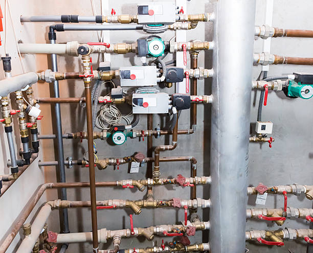istock Pipes and valves of heating system 479506581