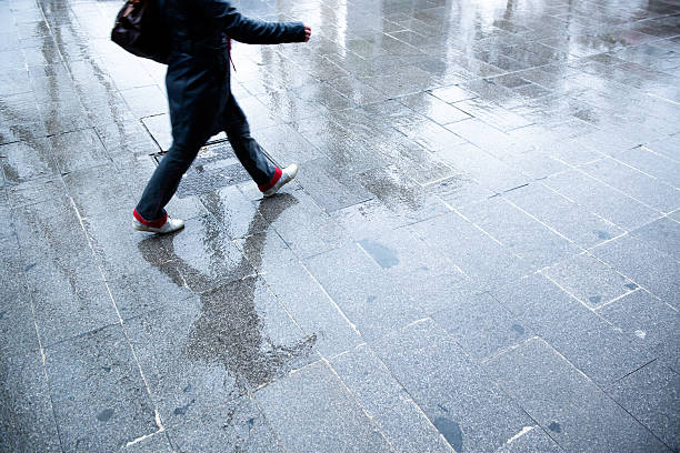 istock Unrecognizable person walking on the street 479510451