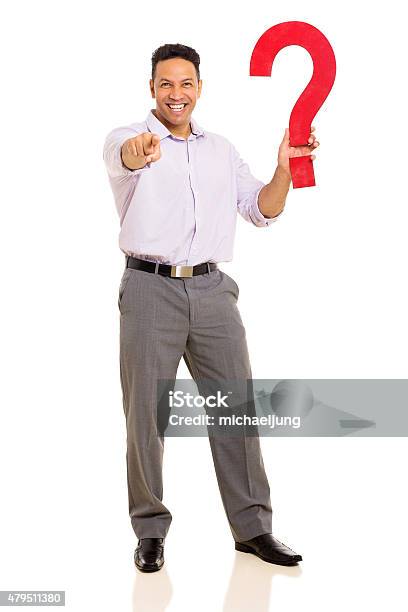 Man Holding Question Mark And Pointing Stock Photo - Download Image Now - 2015, Adult, Adults Only