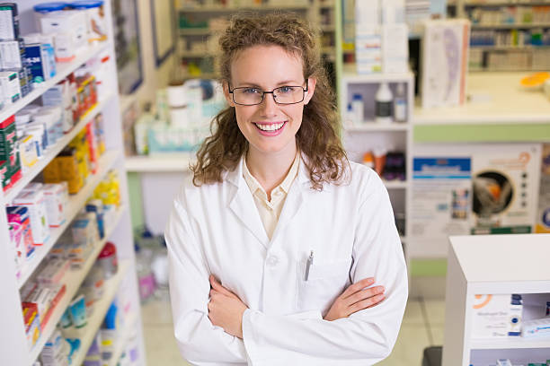 istock Portrait of a smiling pharmacist in lab coat 479511704