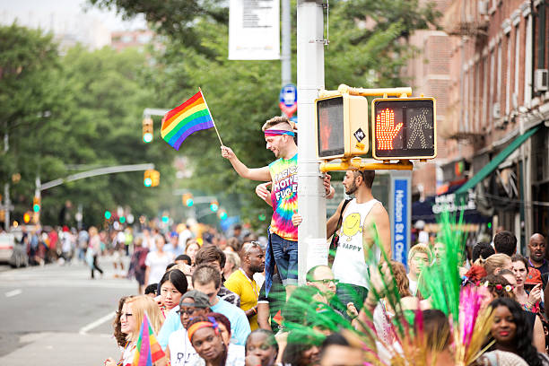 cidade de nova york parada orgulho gay de 2015 - homosexual gay man pride greenwich village - fotografias e filmes do acervo