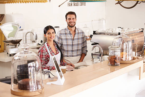 istock Happy young cafe staff, smiling to camera 479512828