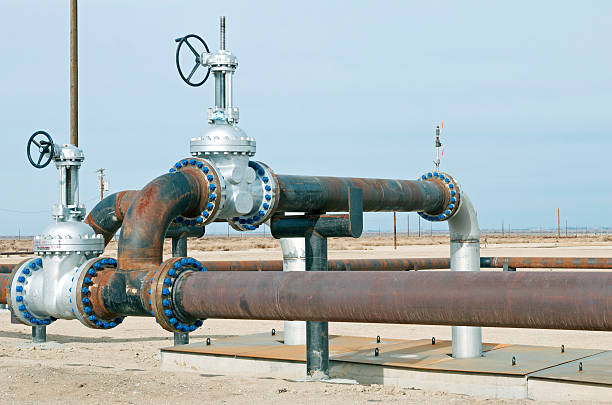 istock Pipelines in oil field with shut-off valves 479519831