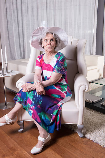 istock active female senior is waiting to go out 479520352