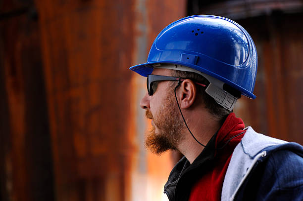 защита работник - oil rig manual worker men occupation стоковые фото и изображения