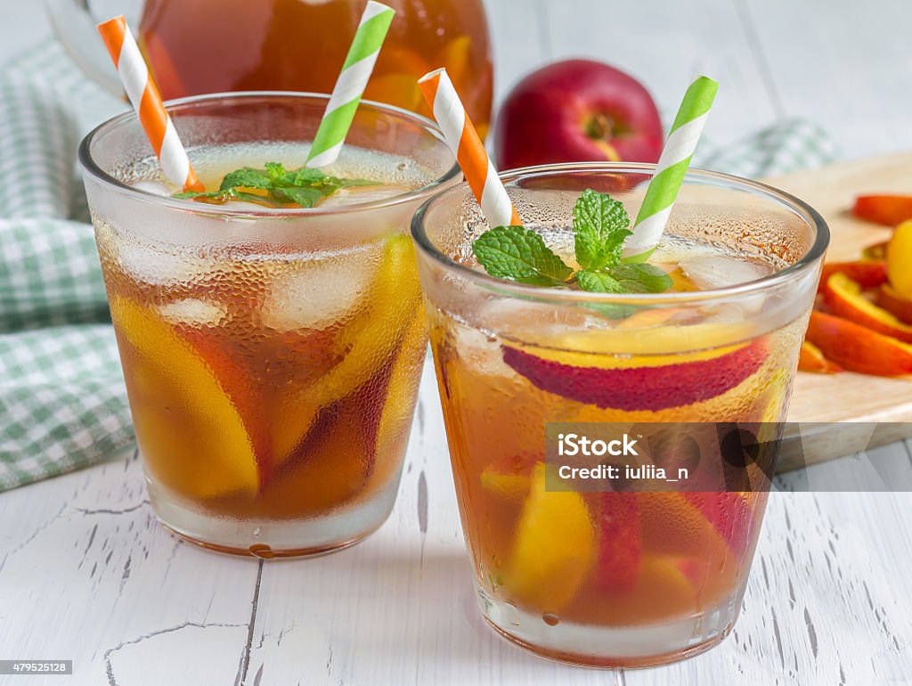 Two glasses of refreshing homemade nectarine iced tea 2015 Stock Photo