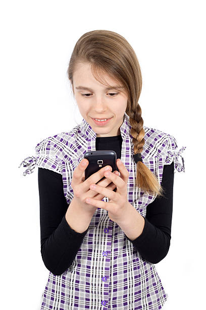 istock Young Girl Sending Text Message on Her Cell Phone Isolated 479526532
