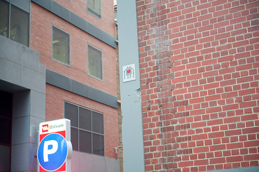 Melbourne, Australia - August 29, 2014: A Space invader symbol on the side of a building in Melbourne. Placed by an unknown artist only known as \