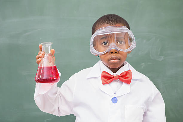 istock Sad pupil holding at a red liquid 479528266