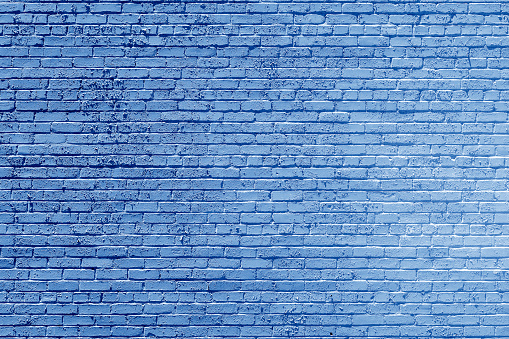 pattern of old historic brick wall in blue