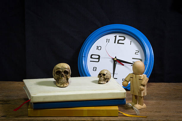 istock Still life art photography concept with skull and time 479530720