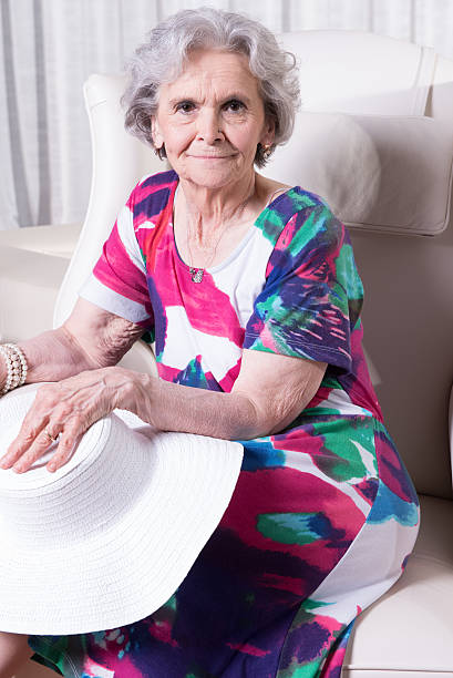 istock active female senior is waiting to go out 479530816