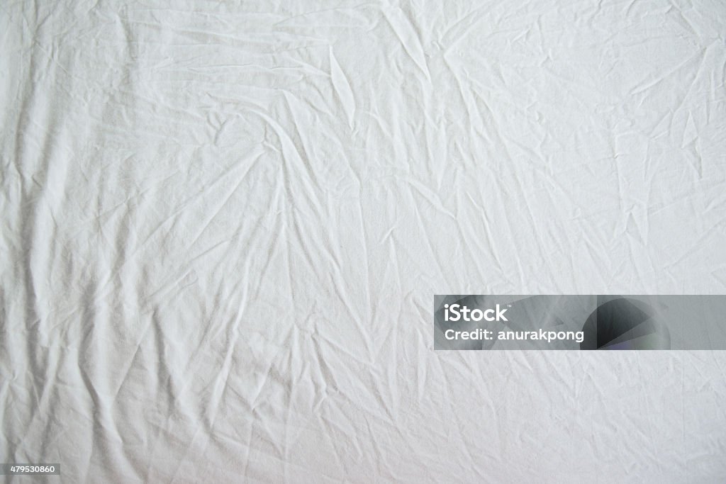 White Wrinkled Fabric Texture White Wrinkled Fabric Texture for back ground Wrinkled Stock Photo