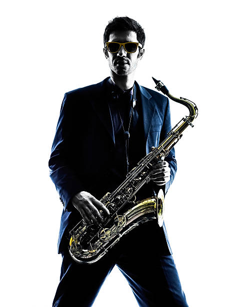 istock man saxophonist playing saxophone player  silhouette 479531146