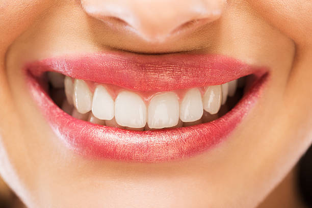 istock Close up of unrecognizable woman's healthy smile. 479532724