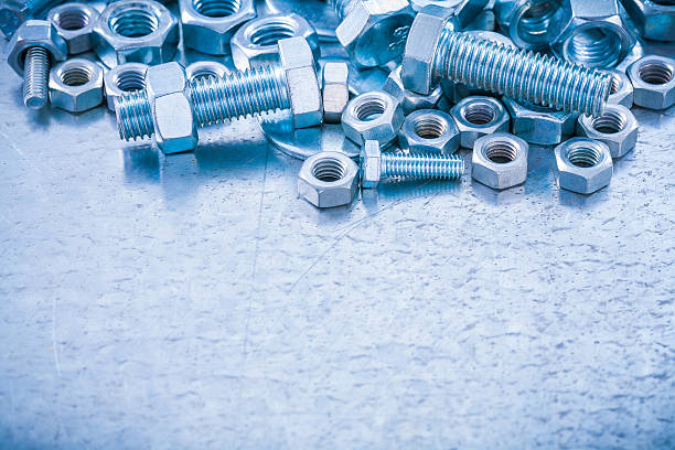 istock Variation of screwbolts nuts and bolt washers on metallic backgr 479533136