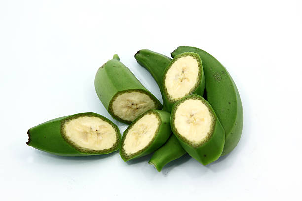 istock Bunch of raw green bananas isolated on white background 479537117