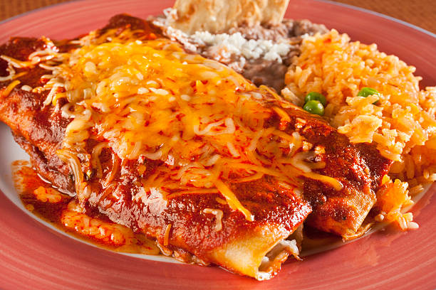 Enchiladas Tex Mex Enchiladas,Tortilla Wraps Filled with Chicken or Cheese Topped with Mole or Tomato Sauce,Tex Mex Food enchilada stock pictures, royalty-free photos & images