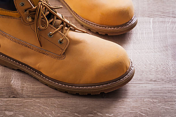 istock very close up view on pair of working boots wood 479537508