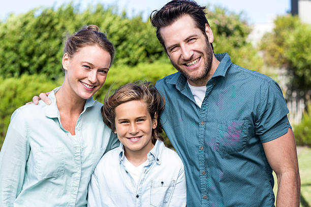 istock Happy family smiling at camera 479537516
