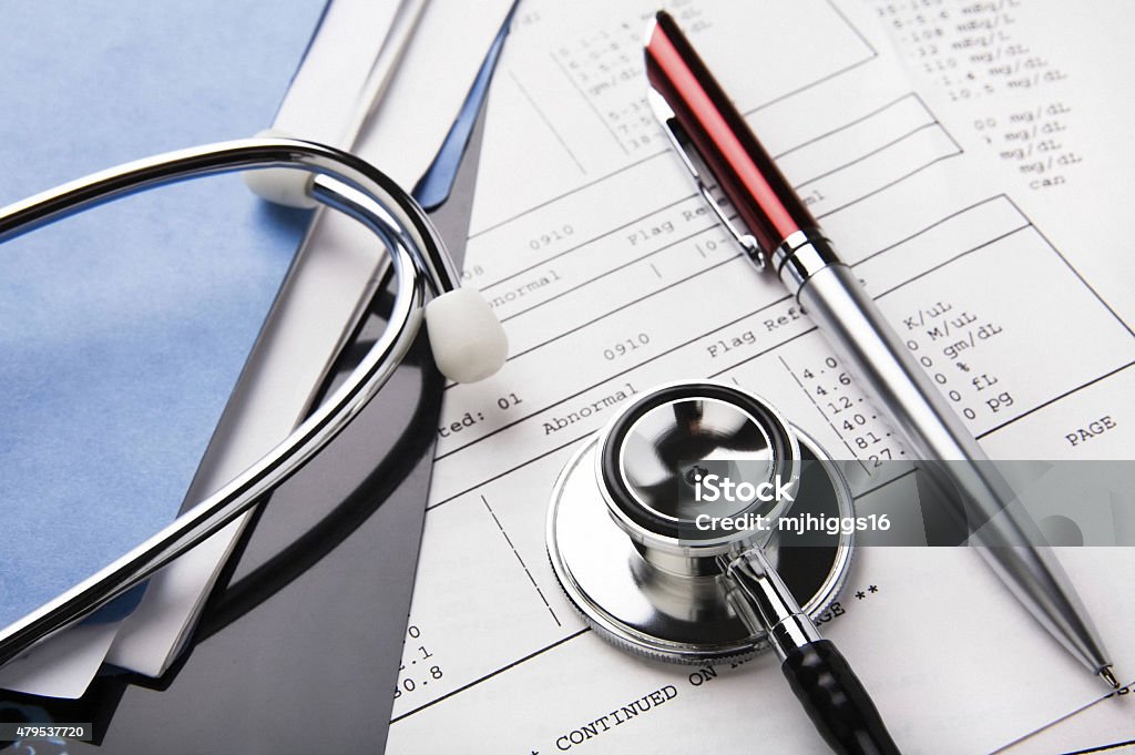 Health care billing statement with stethoscope Health care billing statement with stethoscope, pen. Medical bill is a prototype totally fabricated by artist. 	 Financial Bill Stock Photo