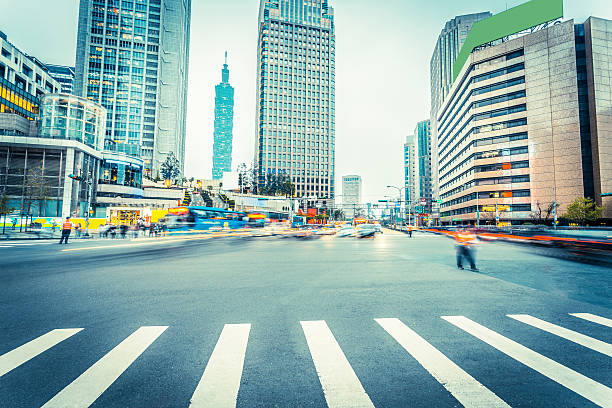 istock traffic blurred motion and office buildings 479539306