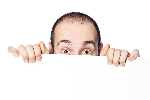 istock The guy looks out for the poster. 479540965