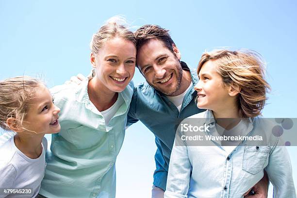 Happy Parents With Their Children Stock Photo - Download Image Now - 20-29 Years, 2015, 25-29 Years