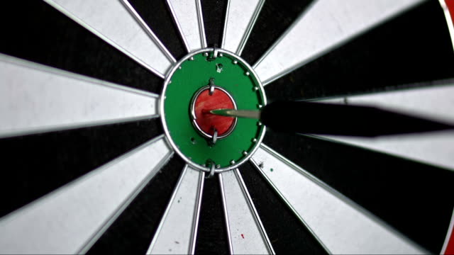 SLO MO darts point hitting the inner bull