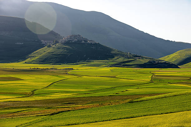istock Castelluccio di Norcia (Italy), Village on a green hill 479545366