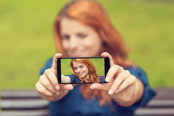 istock Teenage girl making selfie 479545444
