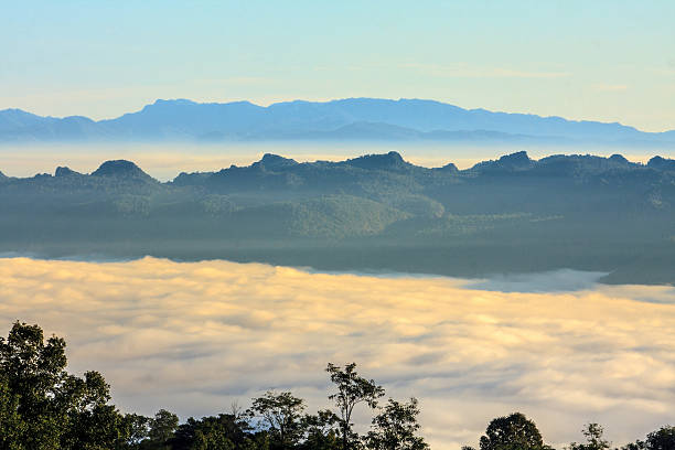 mountains under mist in the morning in Chiangmai ,Thailand stock photo