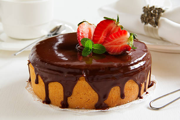 istock Sponge cake with chocolate cream and strawberries. 479546923