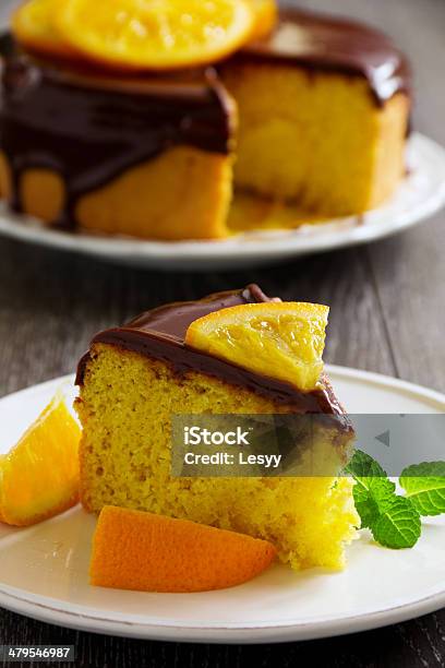 Orange Cake With Chocolate Stock Photo - Download Image Now - Bakery, Baking, Brown