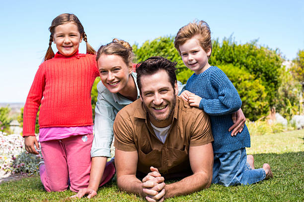 istock Happy family smiling at camera 479549104