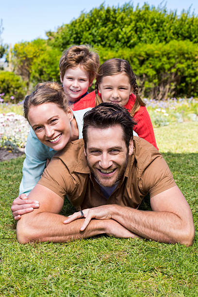 istock Happy family smiling at camera 479549106