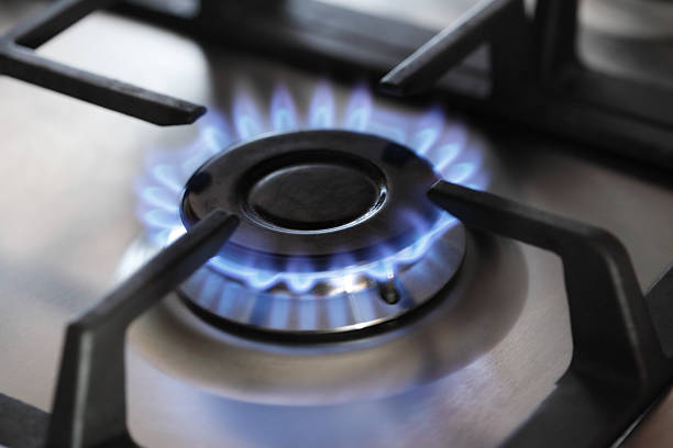 istock gas stove, focus on center burner 479551335