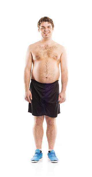 Fat fitness man Fat young man is posing in studio on white background. fat guy no shirt stock pictures, royalty-free photos & images