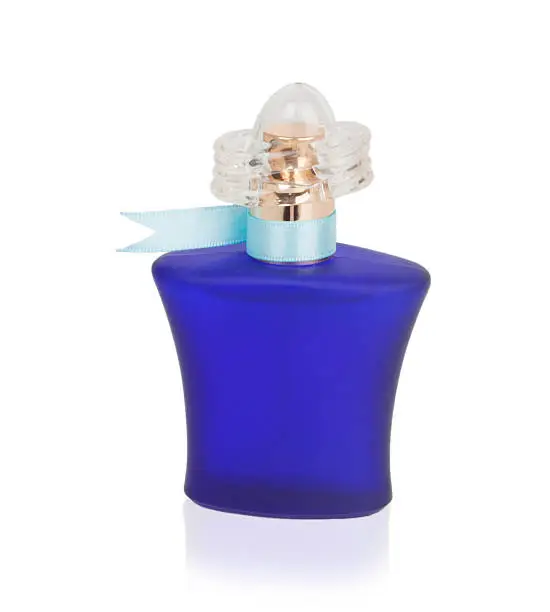 Photo of blue bottle of perfume