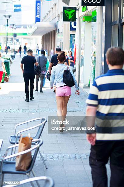 Young Walking Caucasian Girl In Pink Shorts Stock Photo - Download Image Now - 2015, Adult, Beautiful People