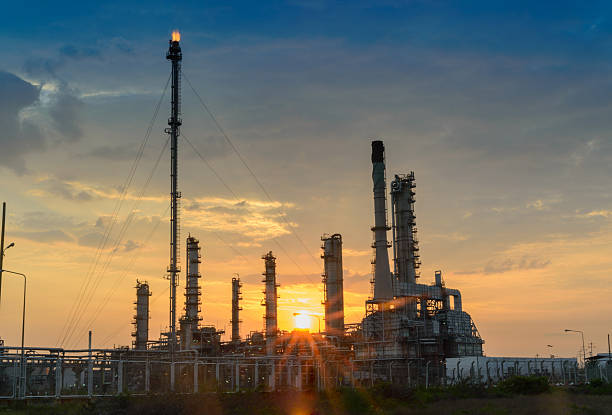 istock Oil refinery at sunrise 479557222