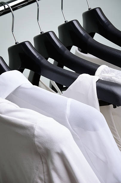istock white womens clothing hanging vertical 479558318