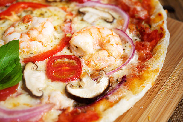 istock Home made vegeterian margarita pizza on table 479560748
