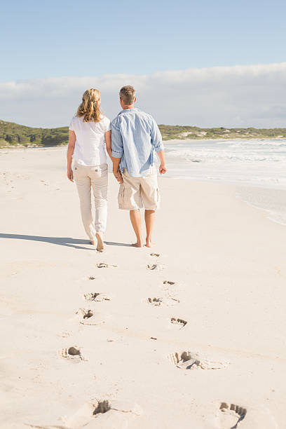 istock Happy couple walking holding hands 479561692