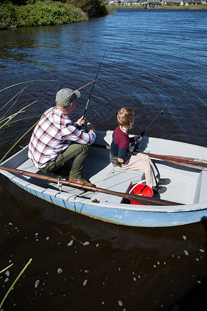Two men relaxing and fishing