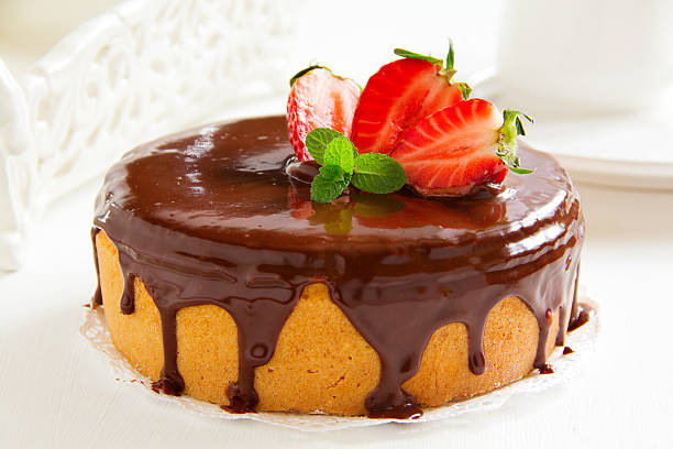 istock Sponge cake with chocolate cream and strawberries. 479566311