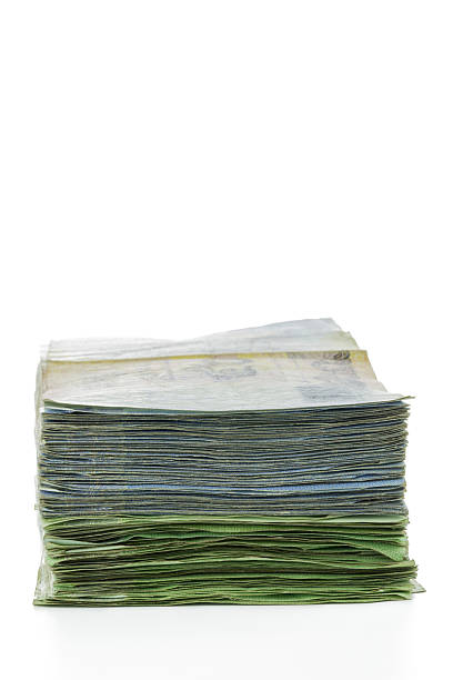 istock Thailand money banknotes stacked isolated 479566424