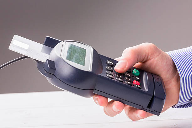 istock Man entering his pin on terminal 479567724